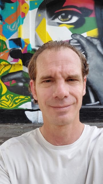 Berlin: Berlin Wall & East Side Gallery Walking Tour - Seeing the Cengaver Katranci Memorial and Wall sites