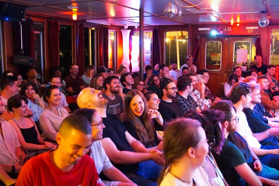 Berlin: Laughing Spree Comedy Show on a Boat - East Side Gallery views between laughs