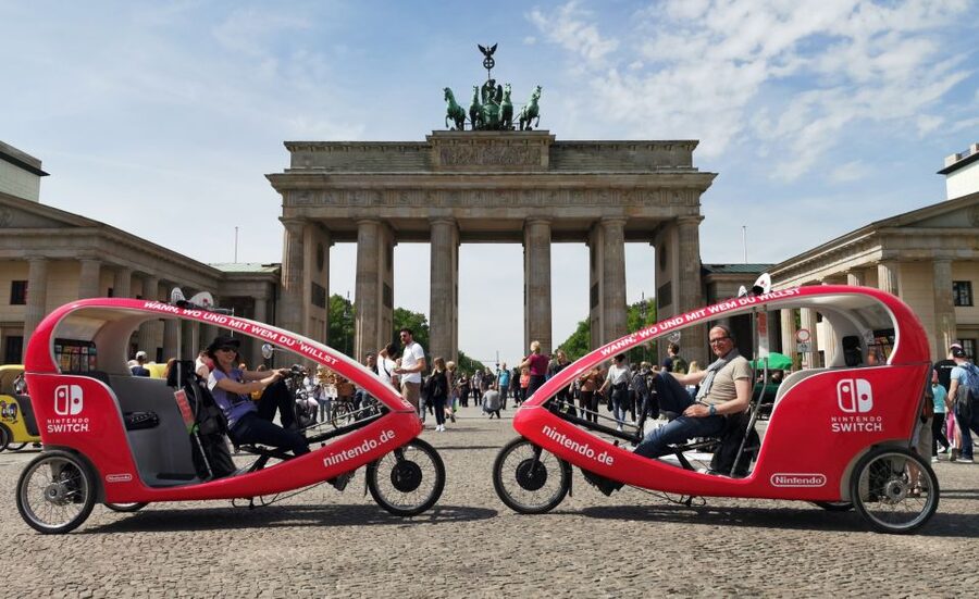 Berlin: Private Guided E-Rickshaw Tour - Meeting the e-rickshaw beside Berlin’s World Time Clock