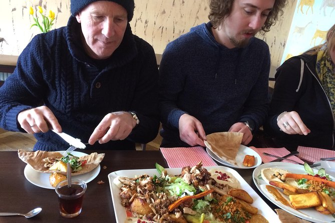 Classic Bites and Culinary Trends Neighborhood Food Tour in Berlin - Berlin beer culture in a neighborhood bar