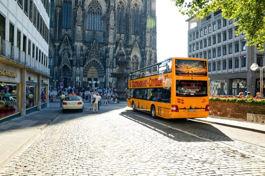 Cologne: 24h Hop-On Hop-Off Sightseeing Bus Ticket - Boarding beside Cologne Cathedral