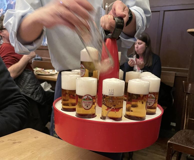 Cologne: 3 Old Town Breweries Guided Walking Tour - Meeting the guide at Heinzelmännchenbrunnen