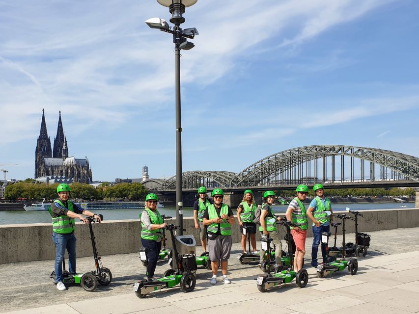 Cologne: Guided E-Scooter Tour - What the three-wheel scooter changes