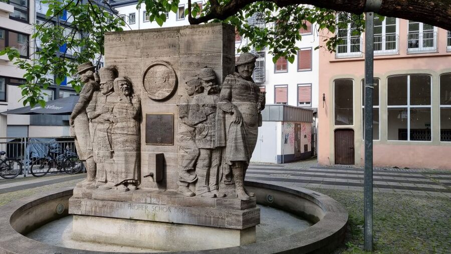 Cologne: Old City Guided Walking Tour - Walking from Roman foundations to modern street life