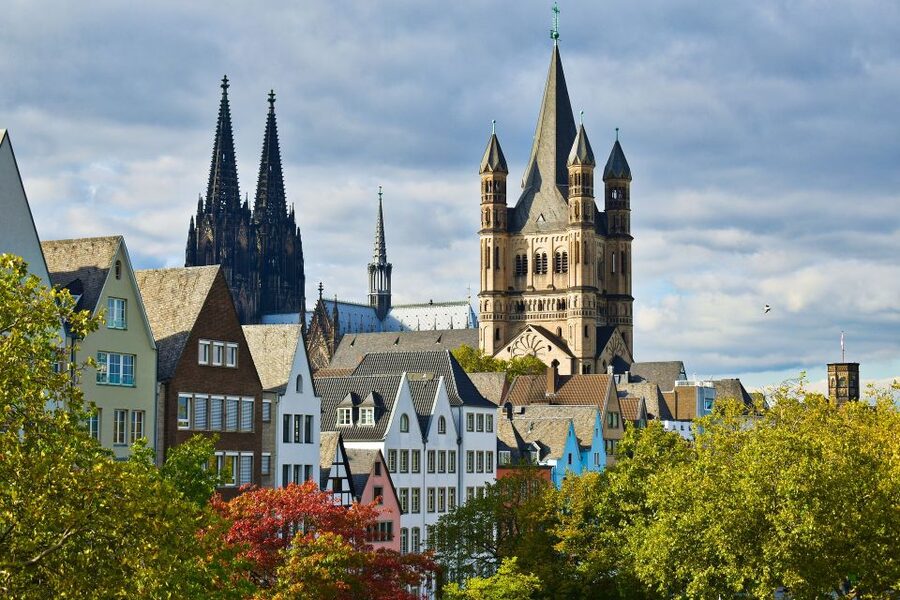 Cologne: Old Town Highlights Walking Tour - Hohenzollern Bridge and two very different Cologne views