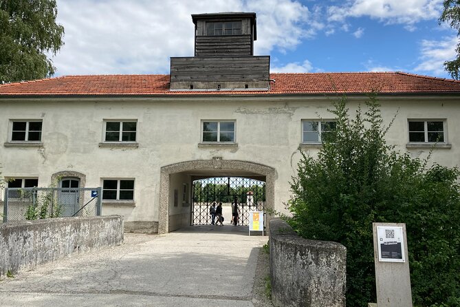 Dachau Concentration Camp Private Tour by Train from Munich - Entering the Dachau memorial grounds