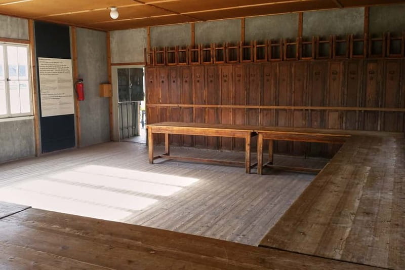 Dachau Memorial Site Tour With Small Group - Riding the train and bus with a guide