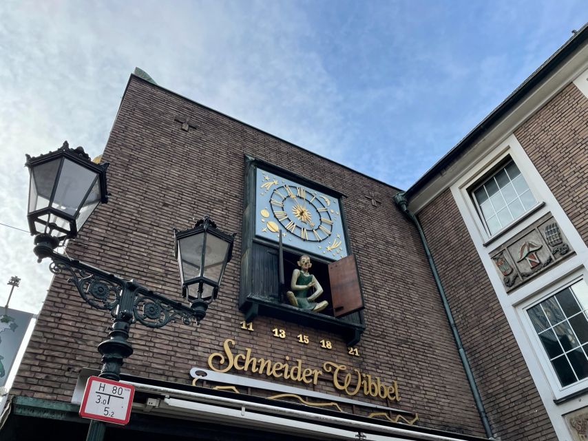 Düsseldorf: Guided Old Town Tour with Beer Break - Königsallee and the world of luxury shopping
