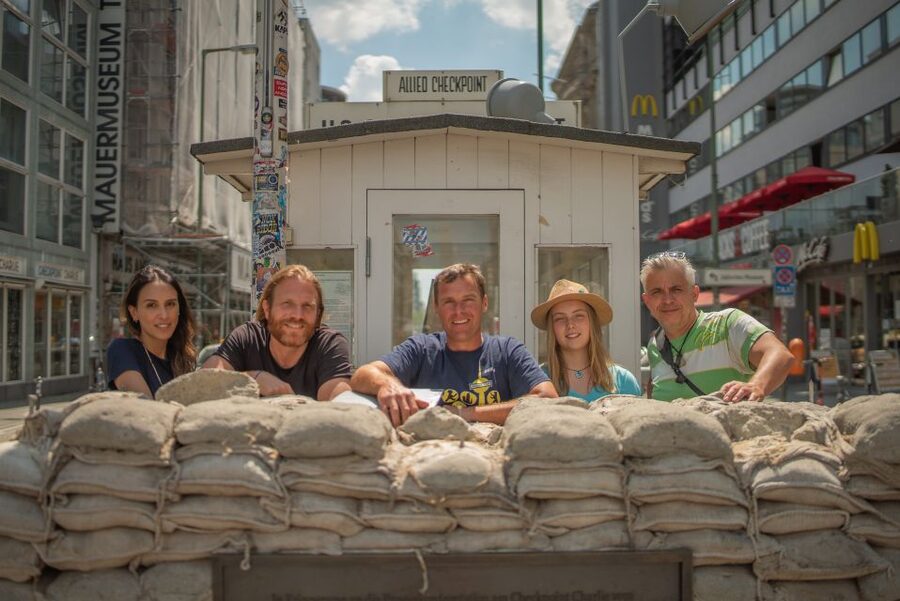 Explore Berlin: Walking Tour of All The Iconic Sites - Touching the Berlin Wall and crossing the former Death Strip