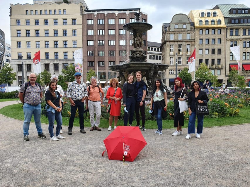 Explore Düsseldorf with Passionate tour guides! - Meeting at Leonidas Under the Red Umbrella