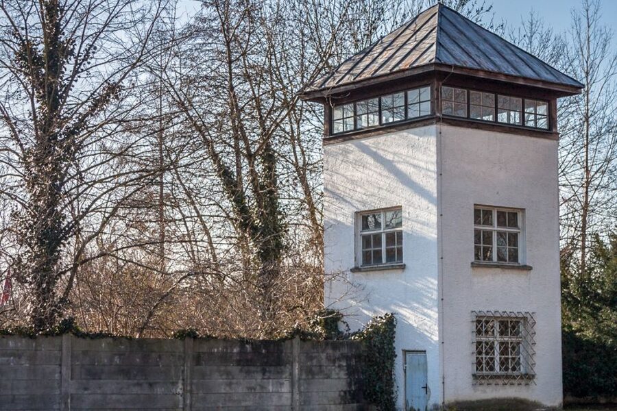 From Munich: Dachau Memorial Site Full-Day Tour - Entering through the Jourhaus and Arbeit Macht Frei