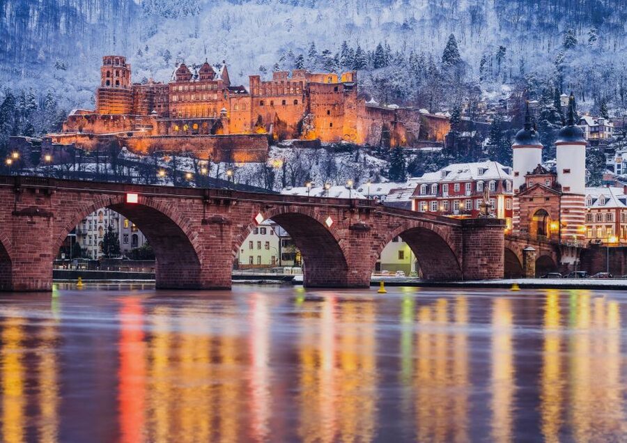 Heidelberg: Sightseeing Boat Tour with Mulled Wine - Returning past the snow-covered old town