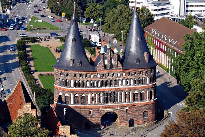 Lübeck Day Trip From Hamburg By Train With Private Guide And Lunch - Crossing the Holsten Gate into old Lübeck