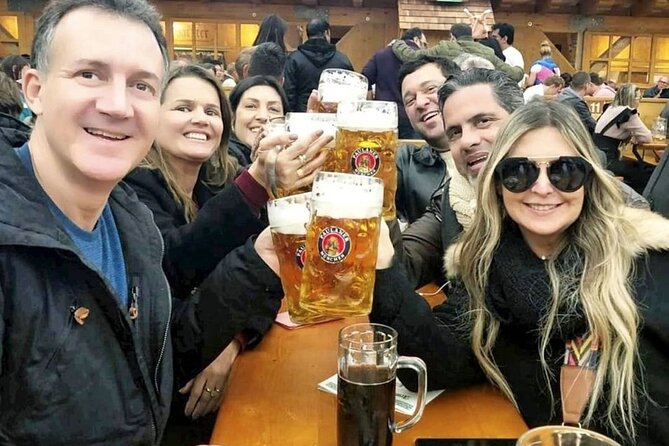 Munich Beer and Bavarian Bites Small-Group Tour - Sitting beneath Frauenkirche with a strong monastery beer