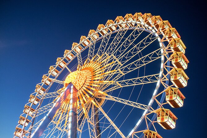 Munich City Walk and Oktoberfest Tour With Beer Tent Reservation - Learning the Oktoberfest grounds before entering