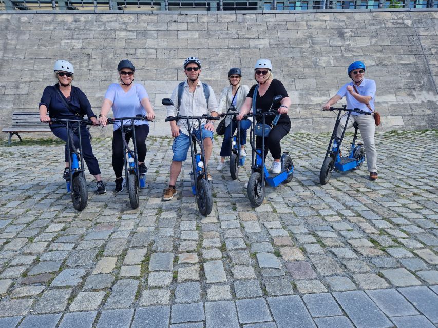 Munich: Top Sights Guided E-Scooter Tour - The English Garden, Chinese Tower, and Eisbach Surfers