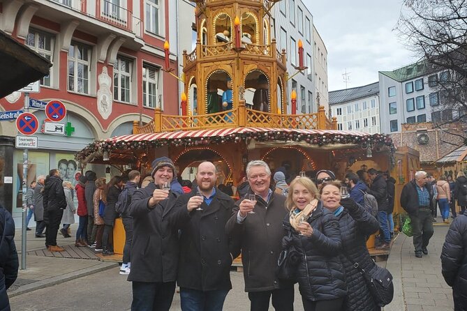 Original Munich Christmas Market Tour with Festive Wine and Food - Starting beneath the Christmas lights at Marienplatz
