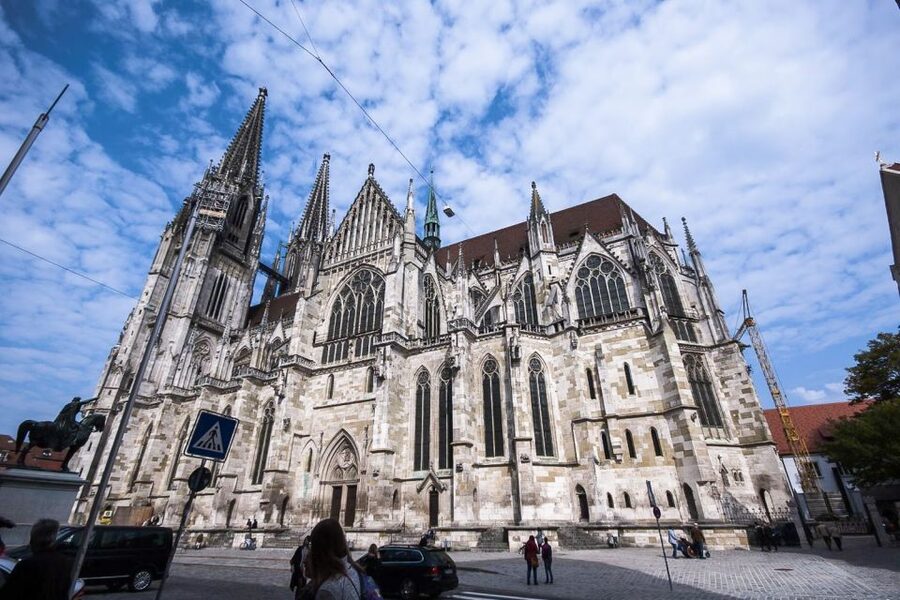 Regensburg: Private Walking Tour With Professional Guide - Crossing the Stone Bridge