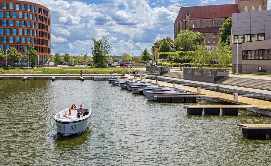 Rostock: Electric Boat Rental on the Warnow River - How to Get the Best Hour on the Water