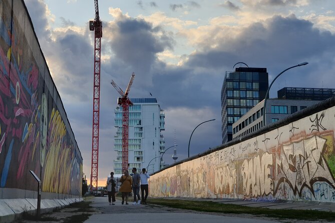 Small Group Walking Tour of East Berlin with a French Guide - Alexanderplatz and the pressure of public protest